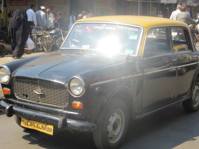Non-AC taxis in Mumbai - cheaper and more fun than their AC brothers.